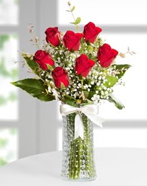 Cam vazoda 7 adet kırmızı gül  Van çiçek , çiçekçi , çiçekçilik 